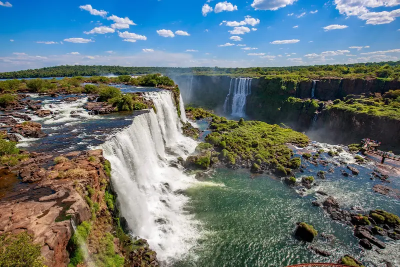 The falls from the Brazilian side, water dropping into the gorge