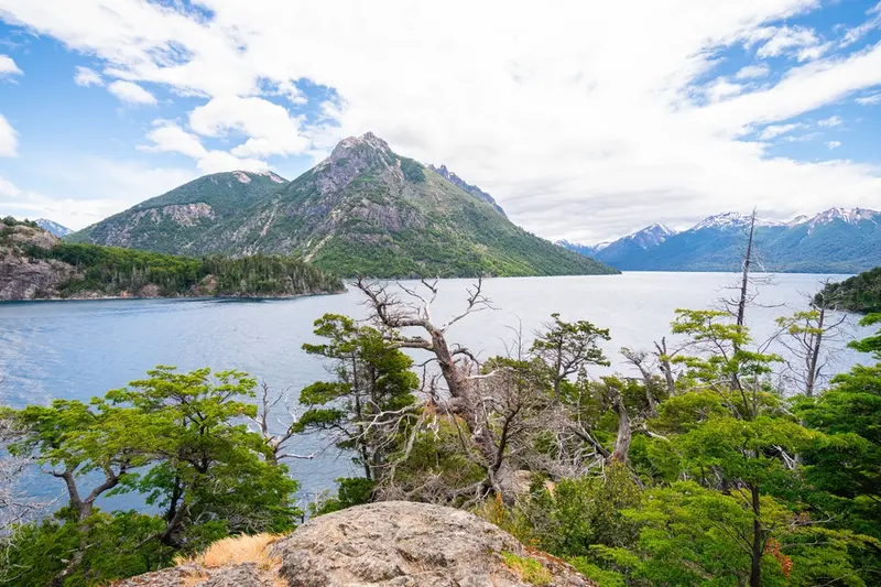 A viewpoint over the lake with a rocky peak behind it