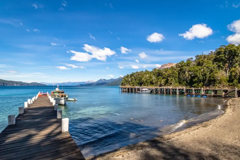 A wooden jetty running out into the lake