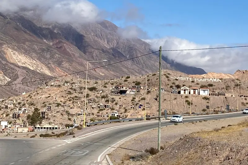 A road running through a village in the dry hills