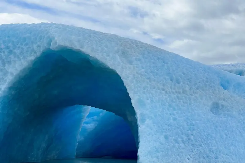 An arch of blue ice in the glacier