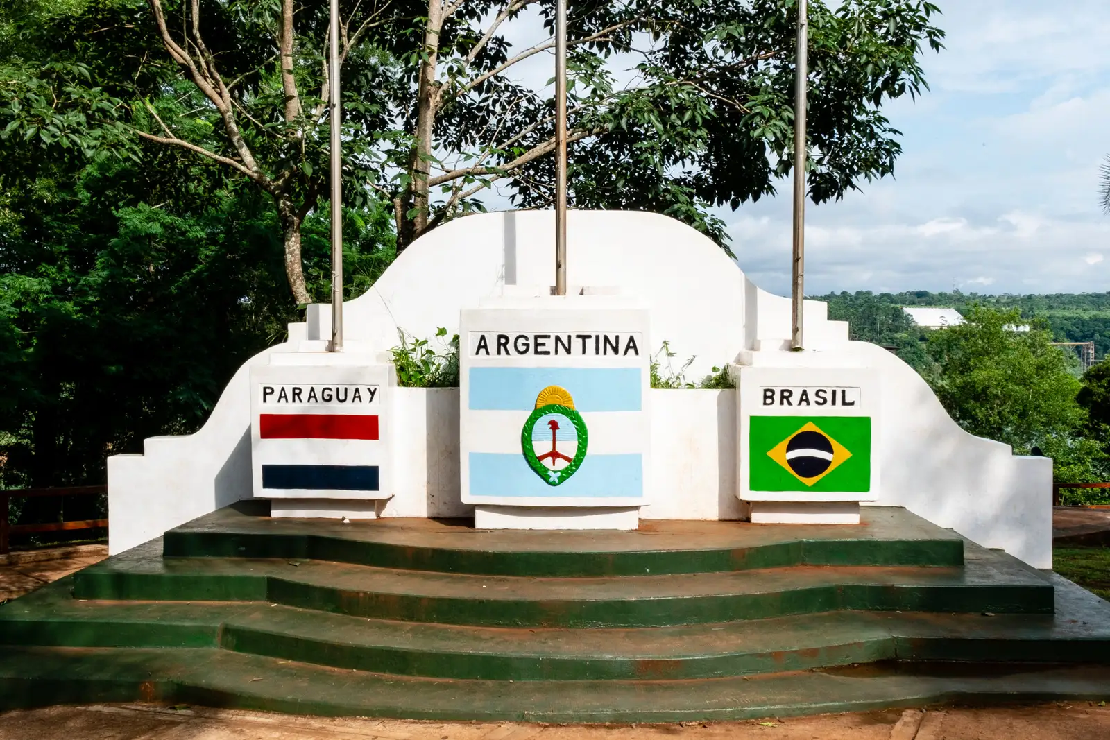 The three-borders landmark, with the Paraguayan, Argentine and Brazilian flags