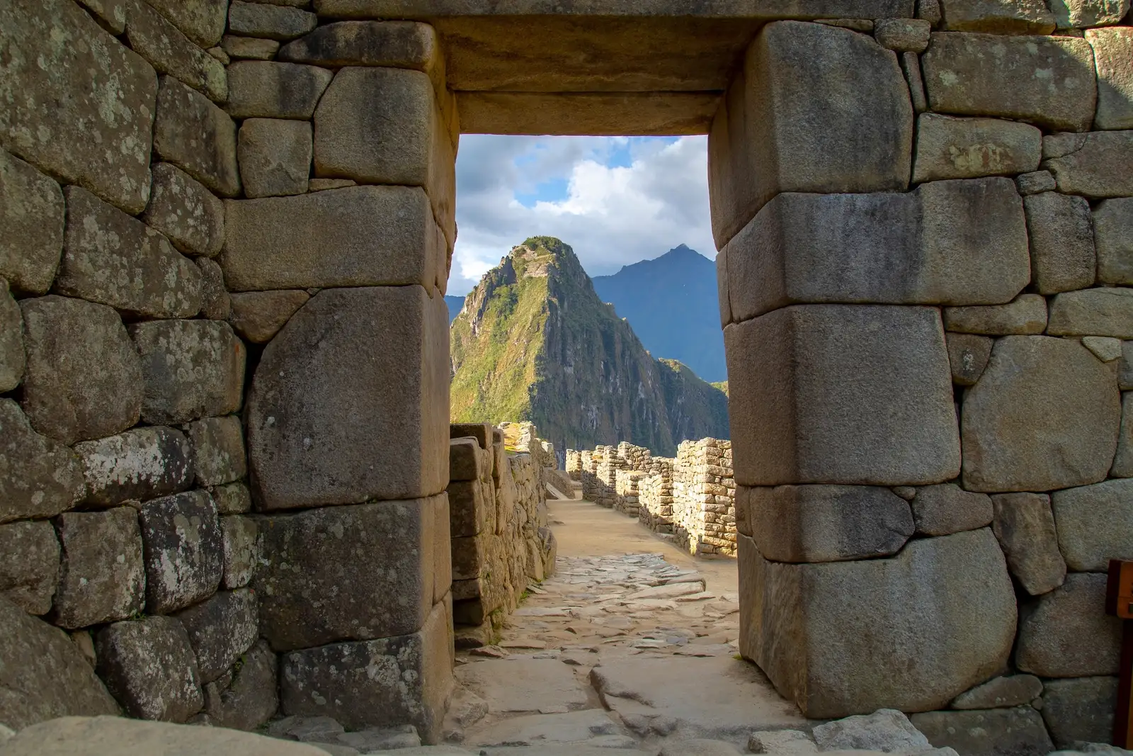 The stone gateway at Machu Picchu, framing the peak beyond
