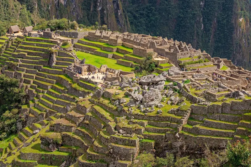 The terraces of Machu Picchu cut into the mountainside