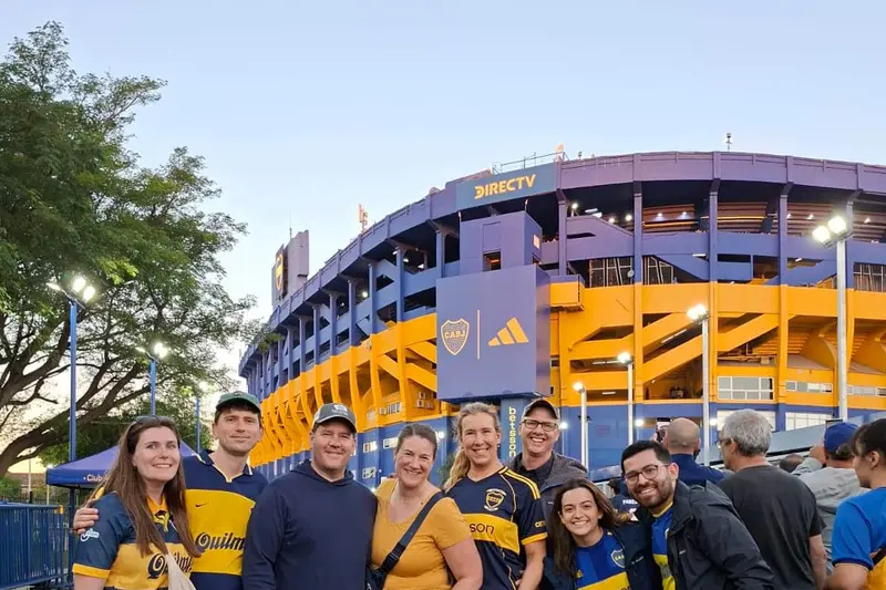 A group in Boca shirts outside the stadium