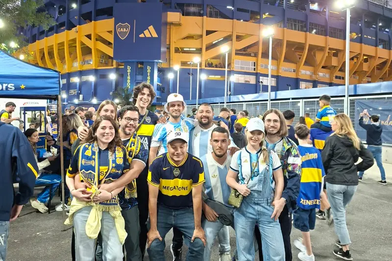 Fans in Boca colours gathered outside the ground