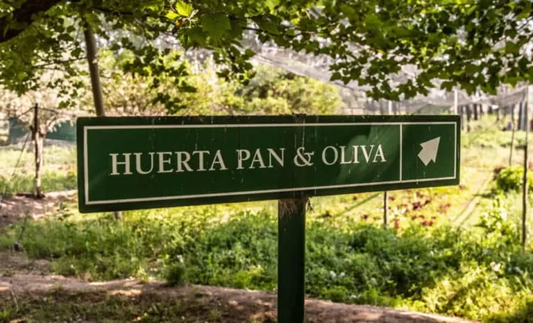 A Huerta Pan & Oliva sign in the kitchen garden
