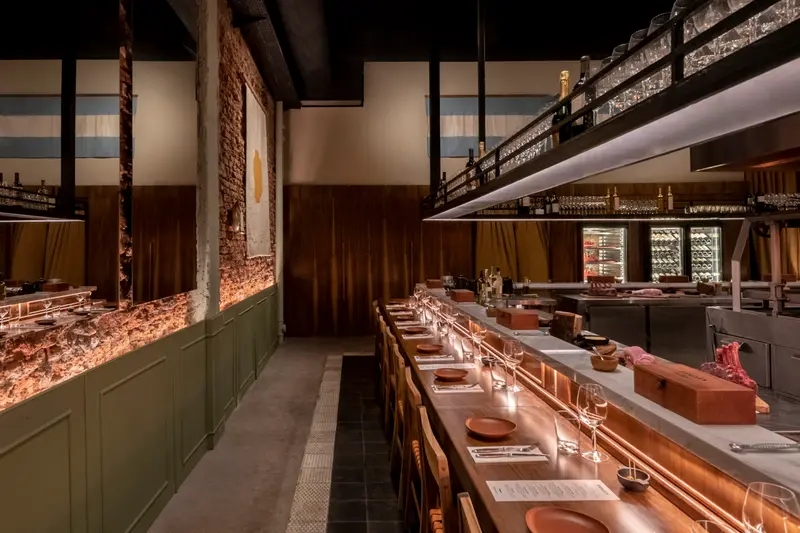 A restaurant interior built around the chef's counter