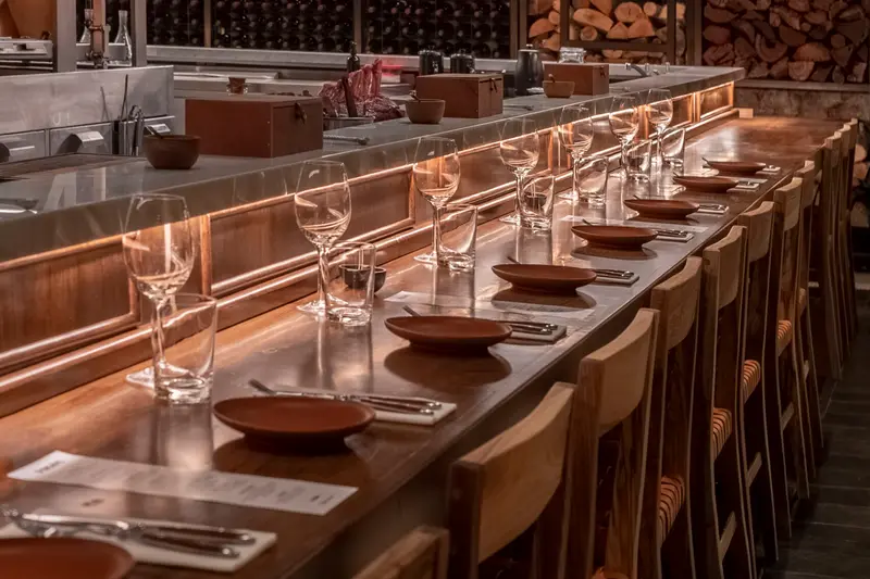 The chef's counter set with glasses and clay bowls
