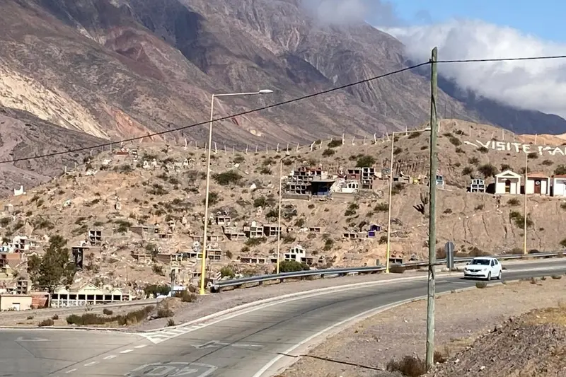 A road running through a village in the dry hills