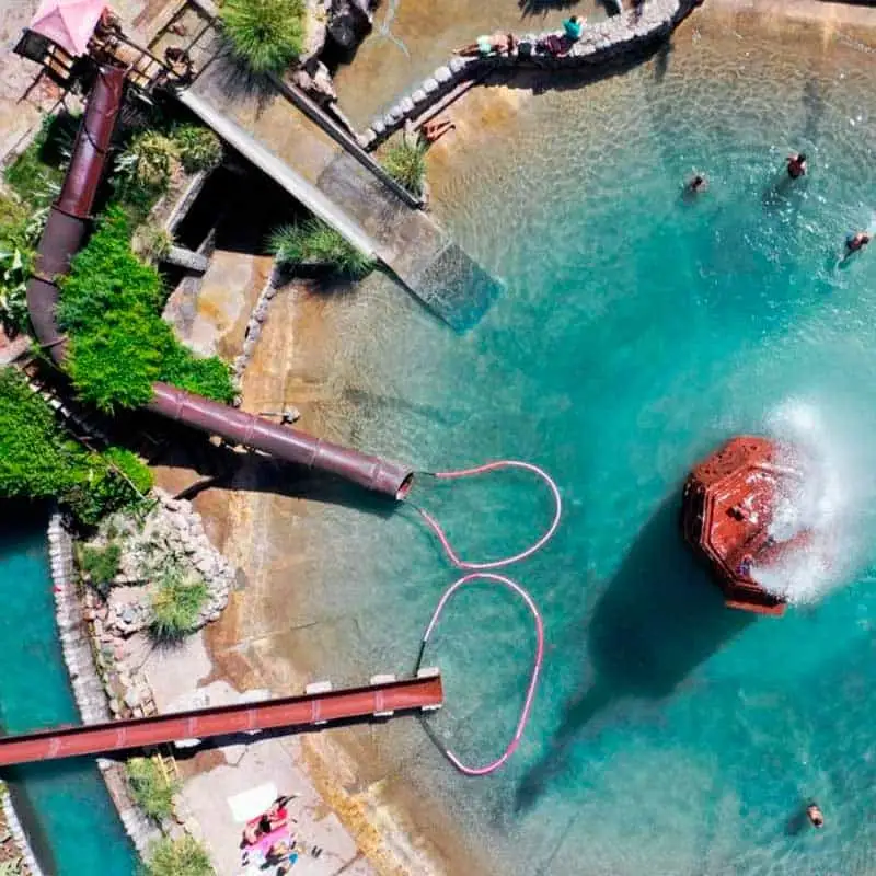 A cable platform over turquoise water, seen from above