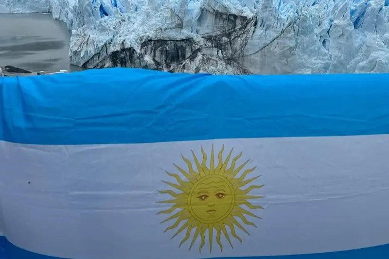 An Argentine flag laid out on the ice