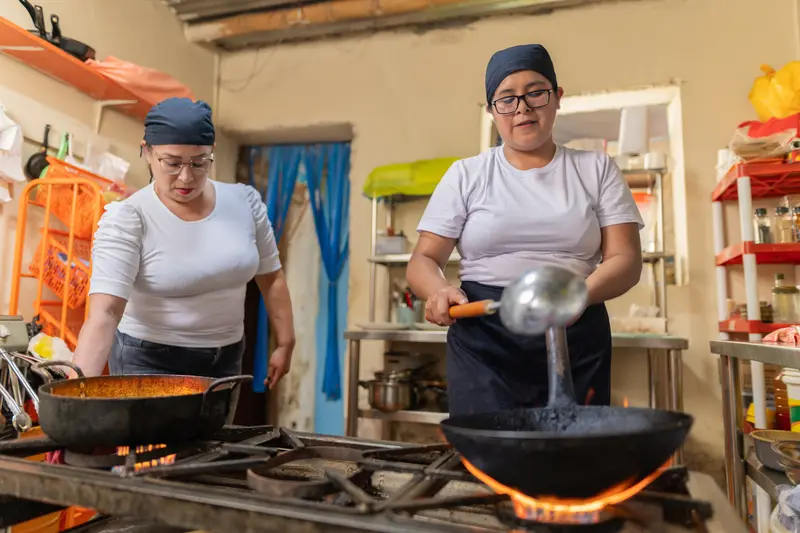Kitchen staff preparing food