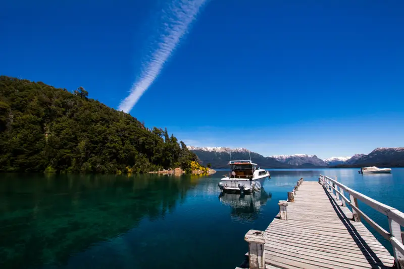 A jetty with a boat moored on the lake
