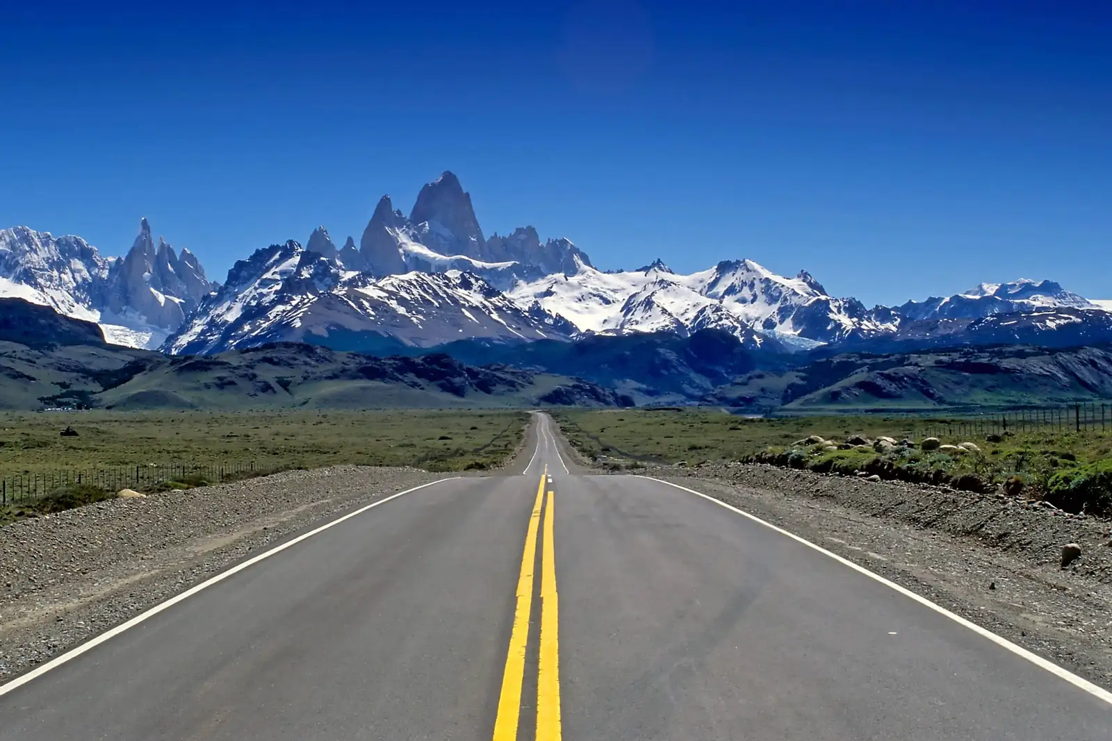 A road running towards the Fitz Roy range
