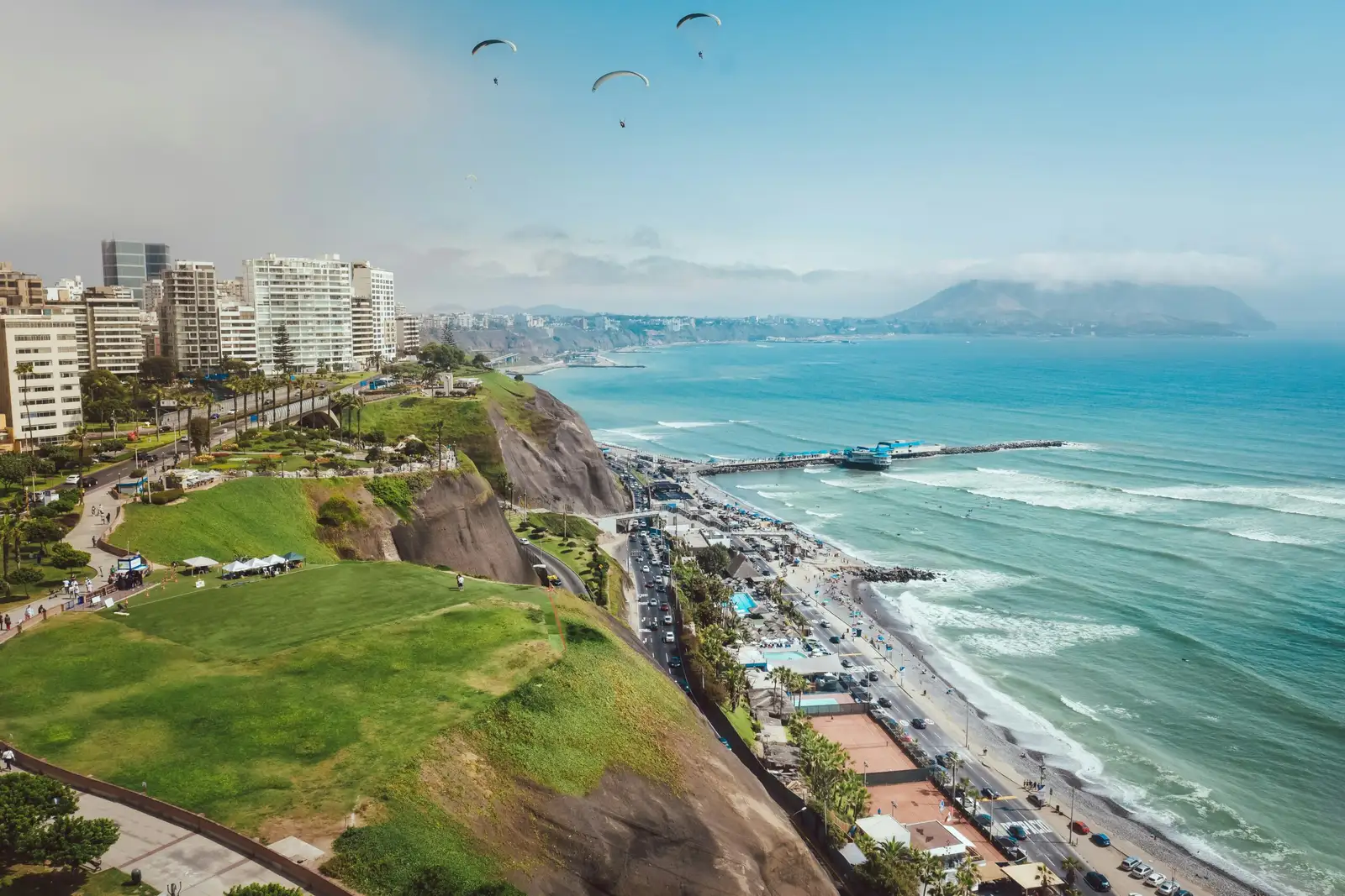 Paragliders over the cliffs of the Lima coast